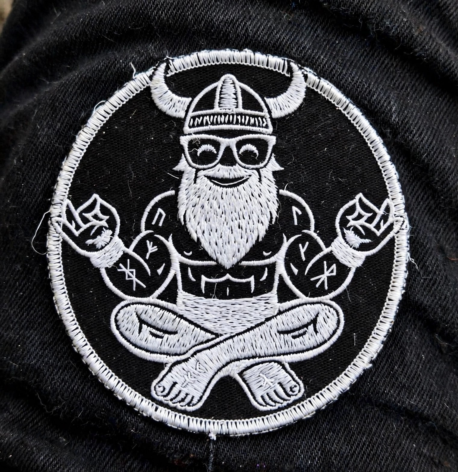 Vanilla Viking circular iron-on patch mockup on denim